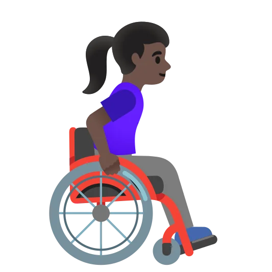 The woman in manual wheelchair facing right: dark skin tone emoji.