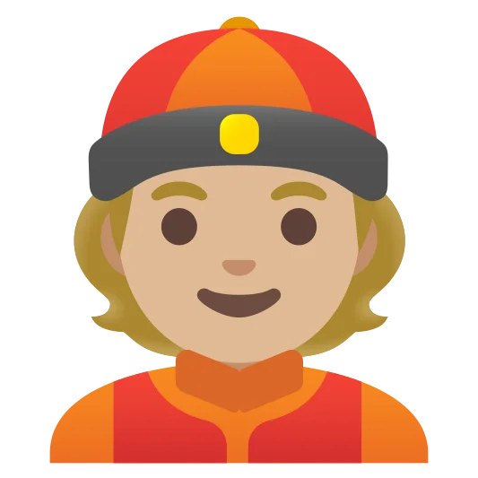 The person with skullcap: medium-light skin tone emoji.