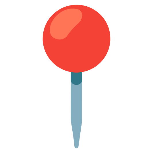 A round pushpin used to mark a location on a map or document.