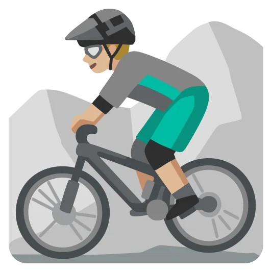 The man mountain biking: medium-light skin tone emoji.