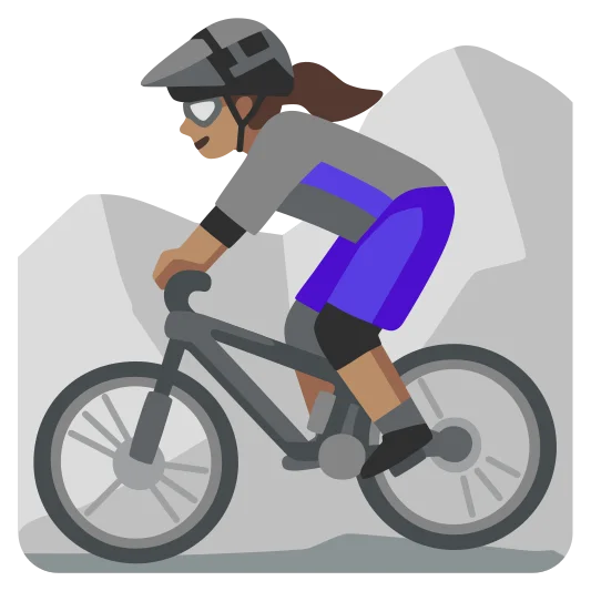 The woman mountain biking: medium skin tone emoji.