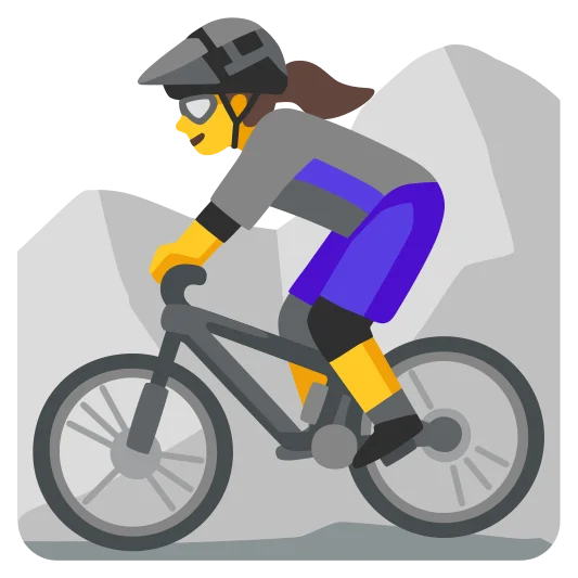 The woman mountain biking emoji.