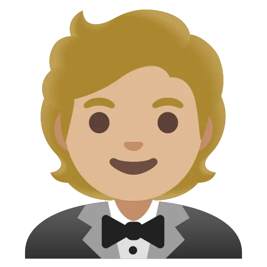 The person in tuxedo: medium-light skin tone emoji.